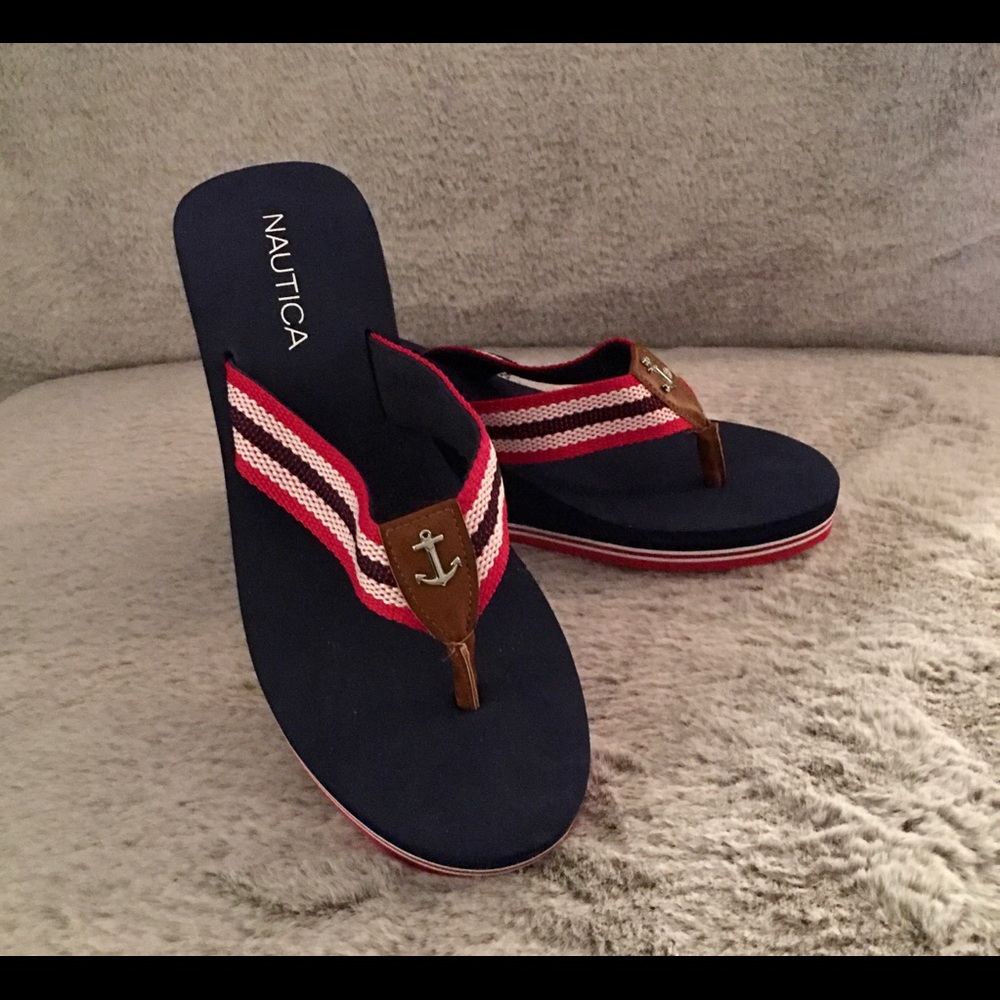Nautica flip flops. 2 1/2 “ heel. Worn once.